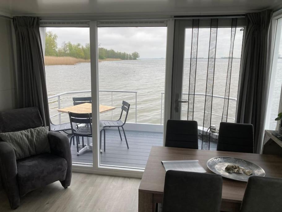 Houseboot Kingfisher, Lake View Biddinghuizen Exterior photo